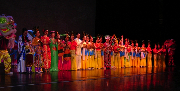 Performers at The Chinese New Year Celebration standing on stage at Clowes Memorial Hall in Indianapolis, Indiana