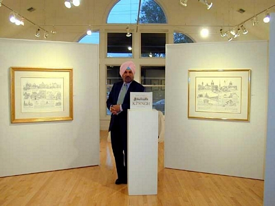 KP standing in front of his drawings at Editions Limited Gallery